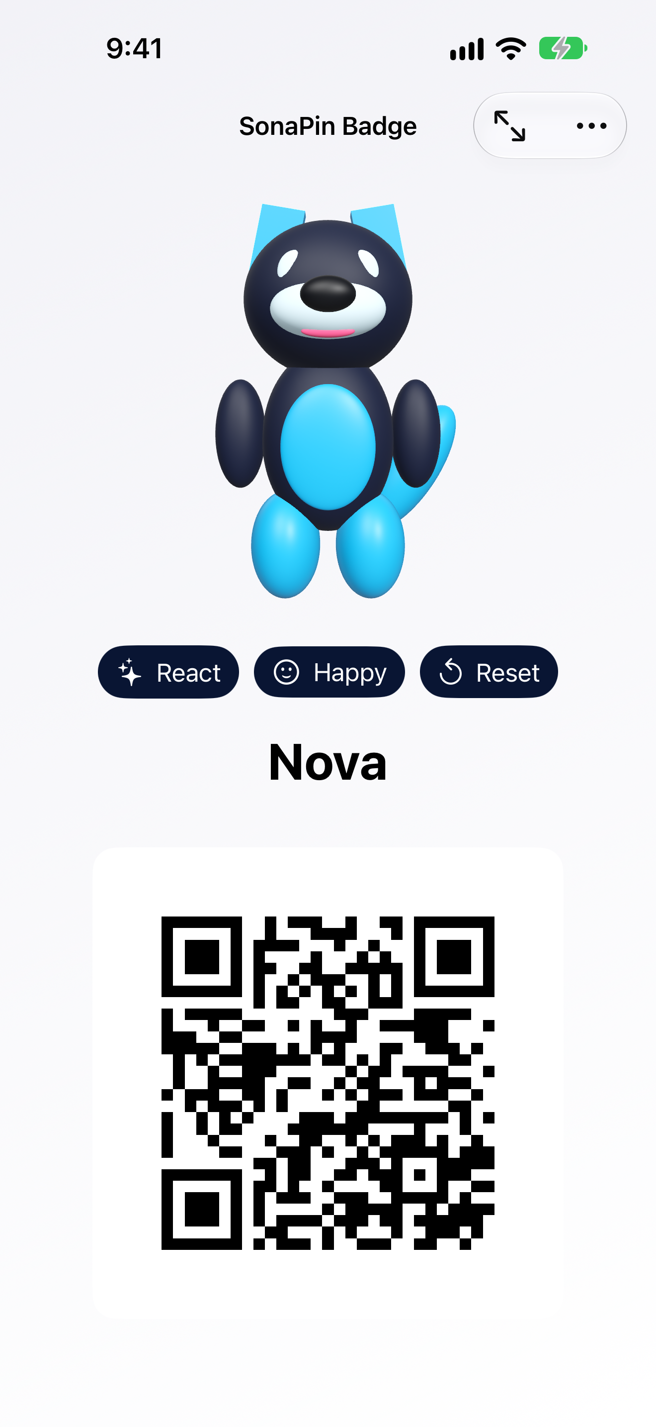 SonaPin badge screen showing the built-in blue wolf avatar, the name Nova, reaction controls, and a QR code linking to the public SonaPin website.